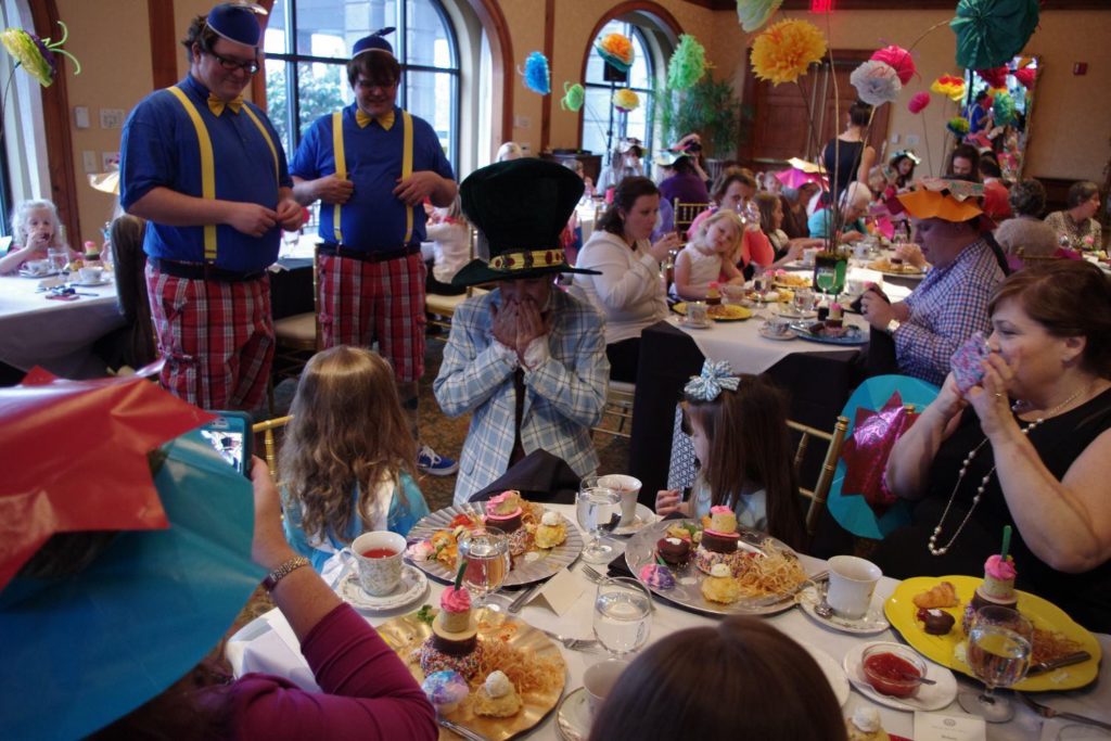 Mad Hatter Tea Mad Hatter and Guests at Mad Hatter Tea at O.Henry Hotel