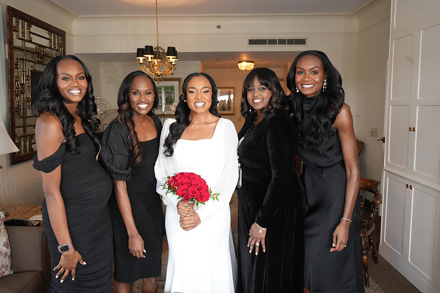 Latisha & Her Wedding Party | Still Shots Photography Latisha and her family pose for a photo in the Magi Suite.