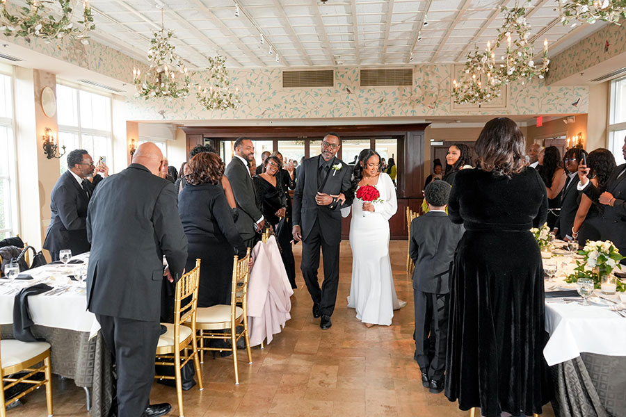 Latisha and Ronald | Still Shots Photography Latisha walked down the aisle beside her father and immediately became overwhelmed with emotion as she saw her sons standing proudly in their suits and Ronald waiting for her with tears in his eyes. Ronald was equally emotional.