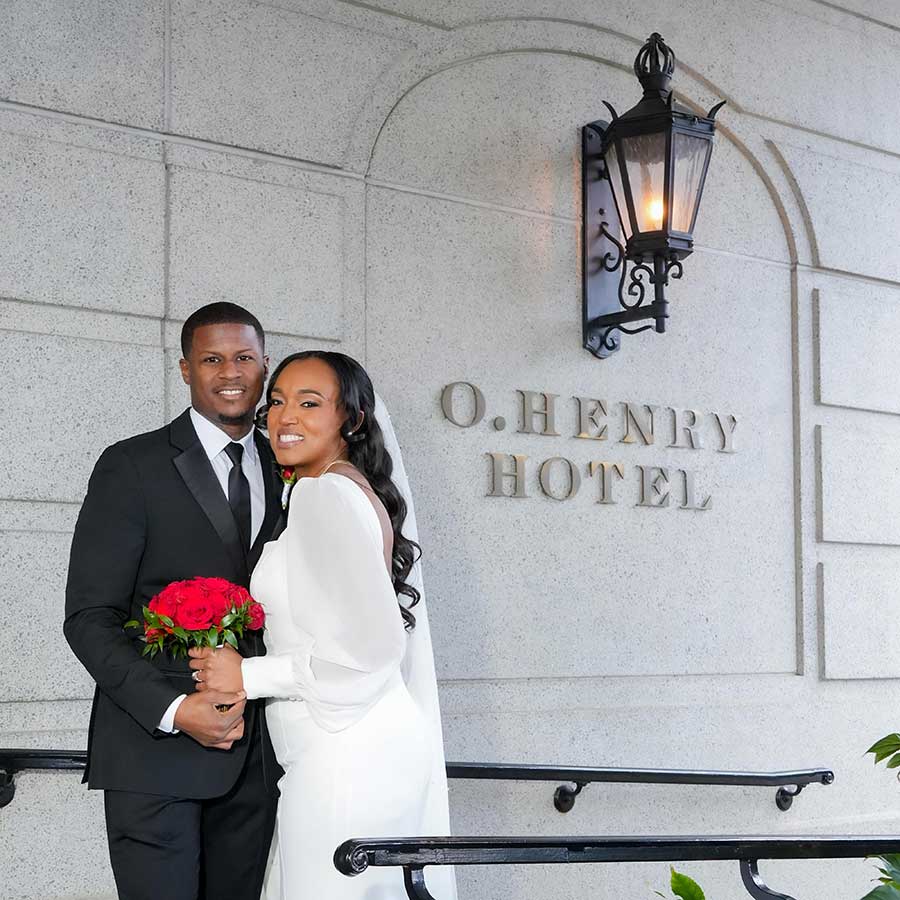 Latisha and Ronald | Still Shots Photography Latisha and Ronald pose in the entry way.