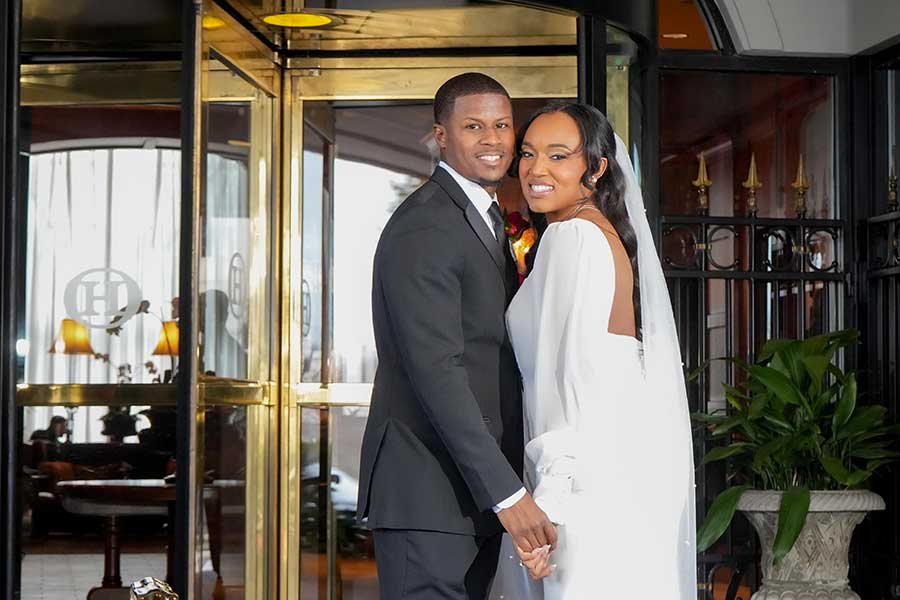 Latisha and Ronald | Still Shots Photography Latisha and Ronald pose in the entry way.