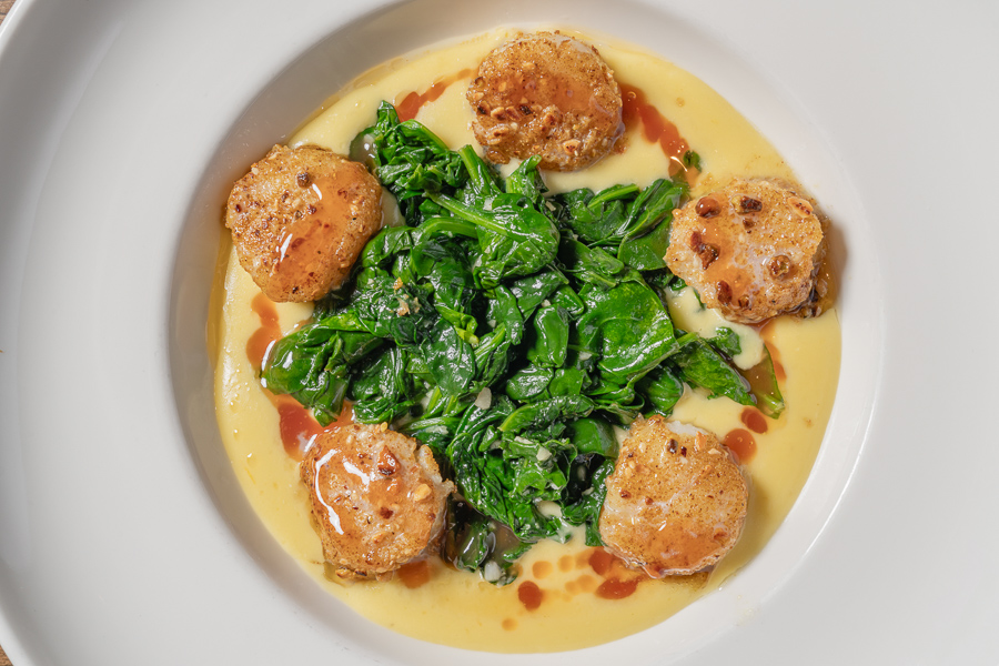 Pan-Seared Scallops Pan-Seared Scallops, pistachio-dukkah dusted charred blood orange brown butter, saffron-fennel purée, wilted greens