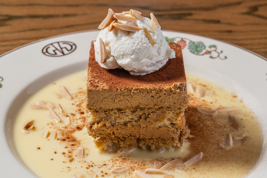 Chai Latte Tiramisu Chai Latte Tiramisu, crème anglaise whipped cream, toasted almonds