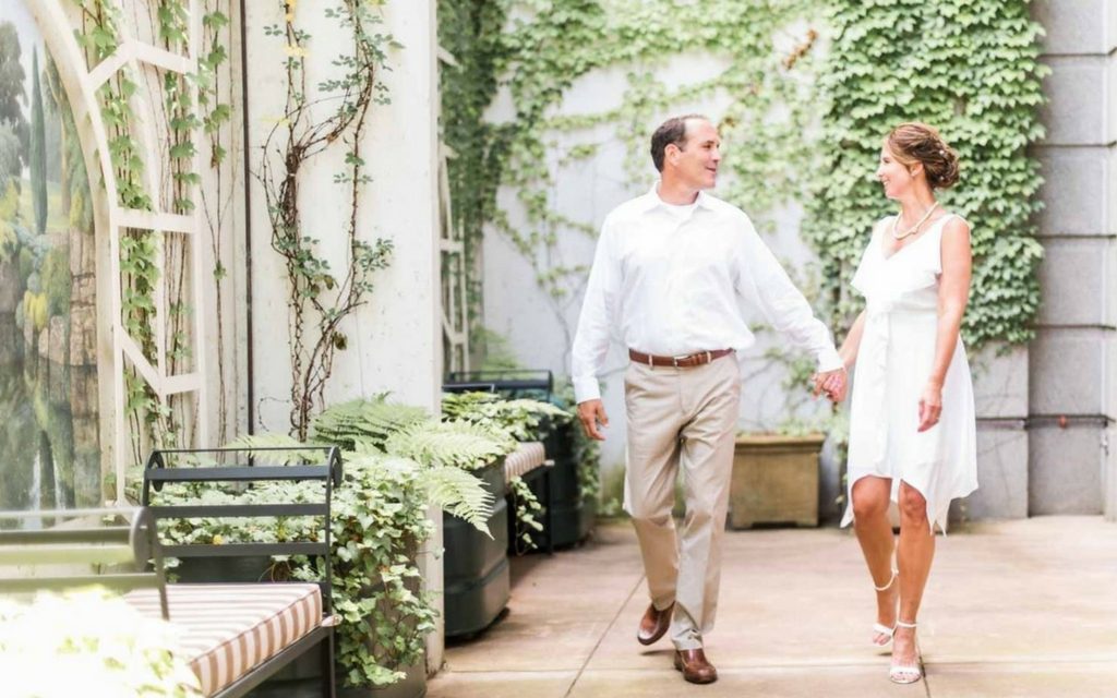 O.Henry Hotel Featured Wedding - Shannon and Greg 8 The bride and groom in the English-Inspired Walled garden at O.Henry Hotel