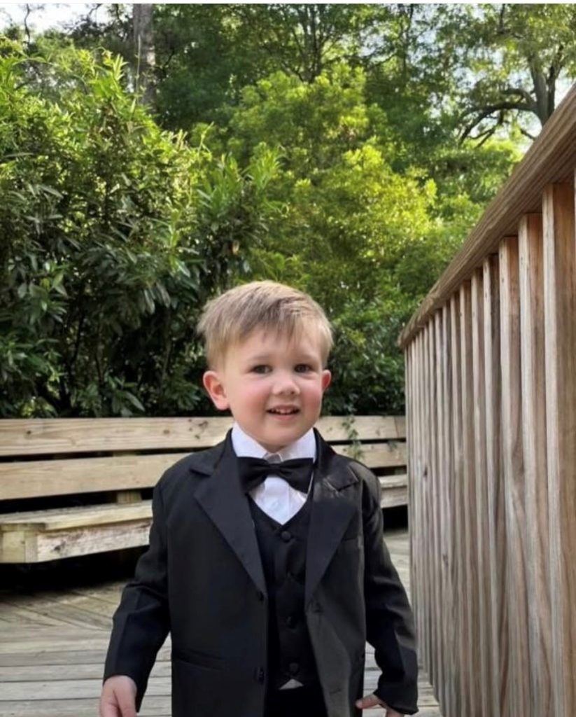 Luca, Kim's three year old grandson was part of the wedding party. He is wearing a tuxedo and a smile on his face! Photo by Brian Anthony Photography.