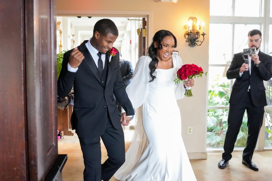 Latisha and Ronald | Still Shots Photography Latisha and Ronald enter their reception enthusiastically as they are greeted by cheering guests